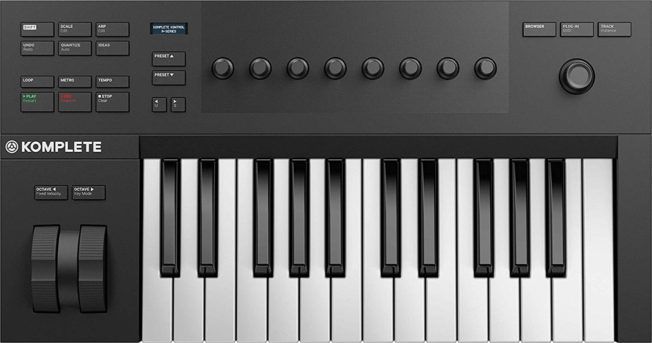 A keyboard with the word komplete on it