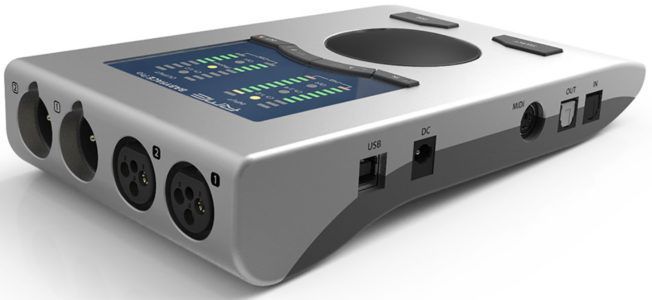 A silver device with a screen and a bunch of ports
