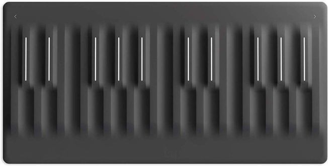 A black keyboard with white keys on a white background.