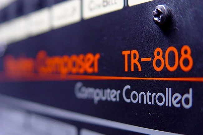 A close up of a computer controlled composer tr-808