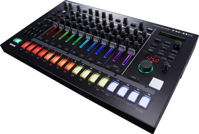 A black mixer with a green button that says 12:50