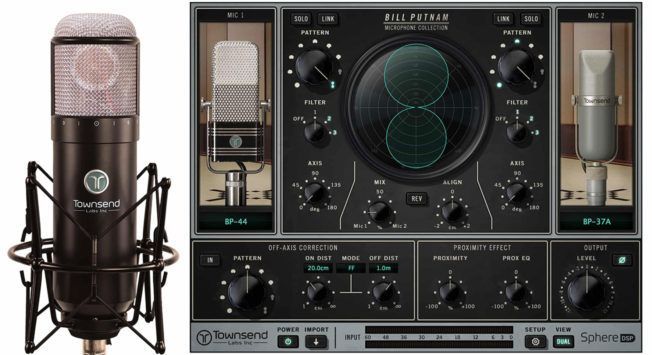 A microphone next to a mixer that says full prime