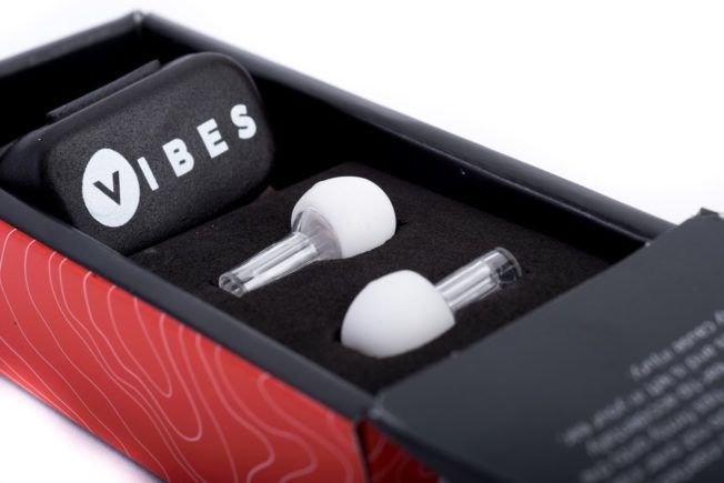 A pair of vibes ear buds in a red and black box