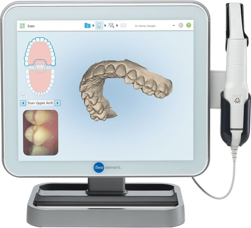 Dental 3D scanner display with tooth model and handheld wand beside the screen.
