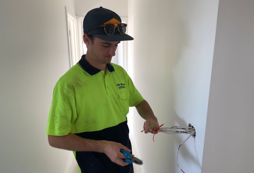 A Reliable Electrician At Work In Wollongong Home