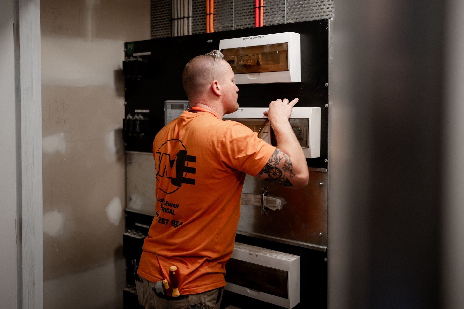 Electrician Inspecting Electrical Switchboard Panel In Shellharbour