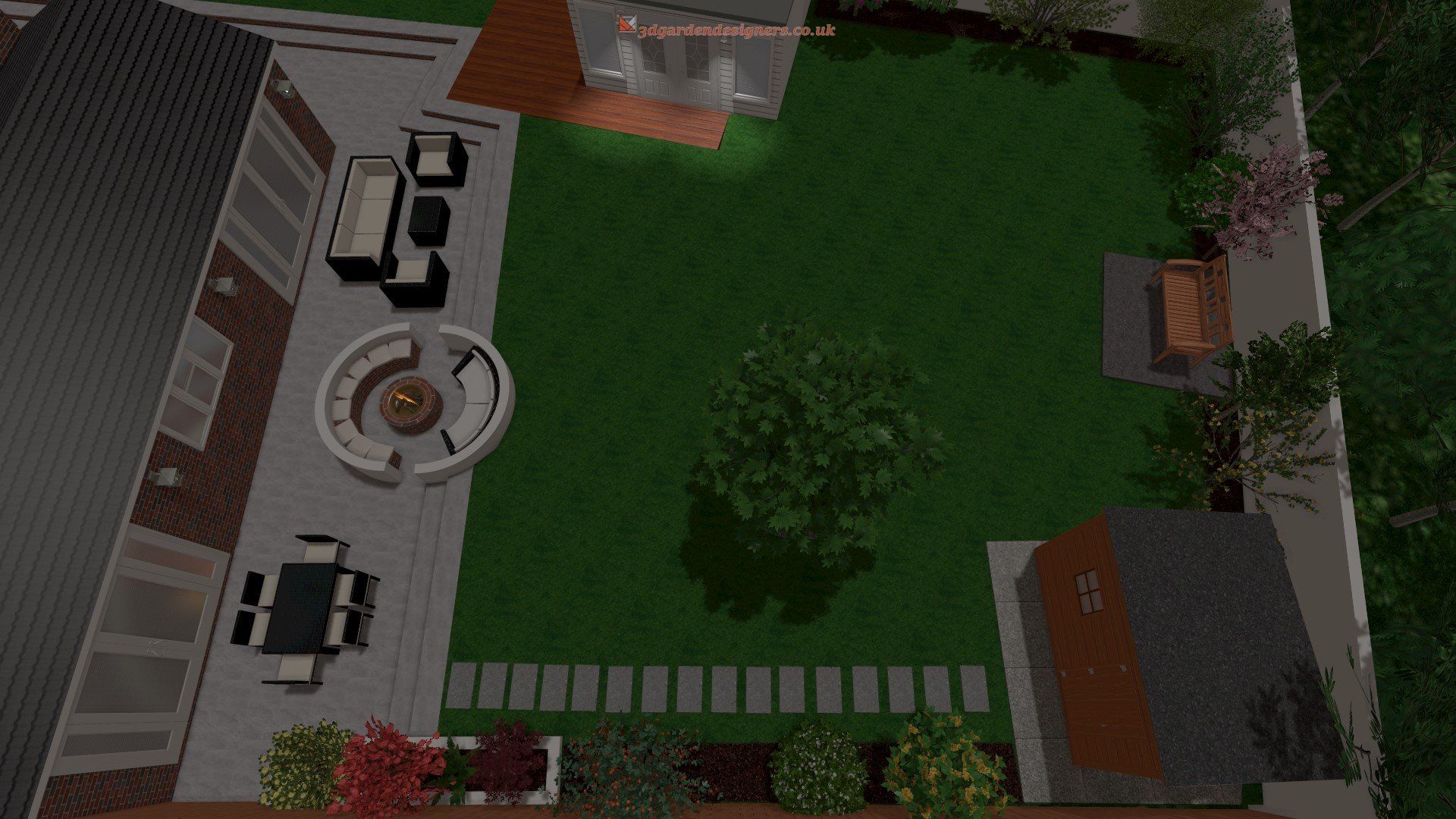 An aerial view of a backyard with a fire pit and patio furniture.
