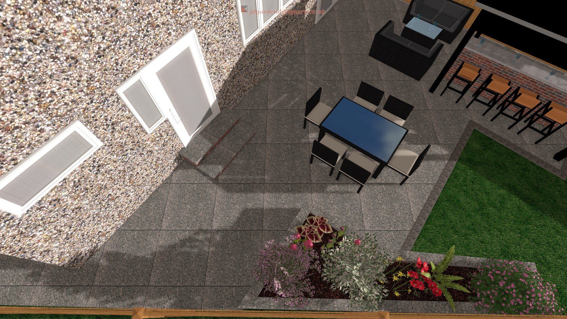 An aerial view of a patio with a table and chairs.