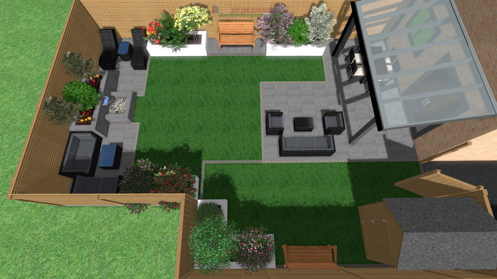 An aerial view of a backyard with a patio and lawn.