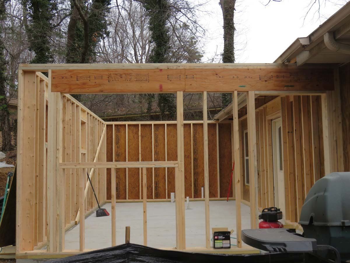 A home addition of a covered porch being built in Asheville, NC.