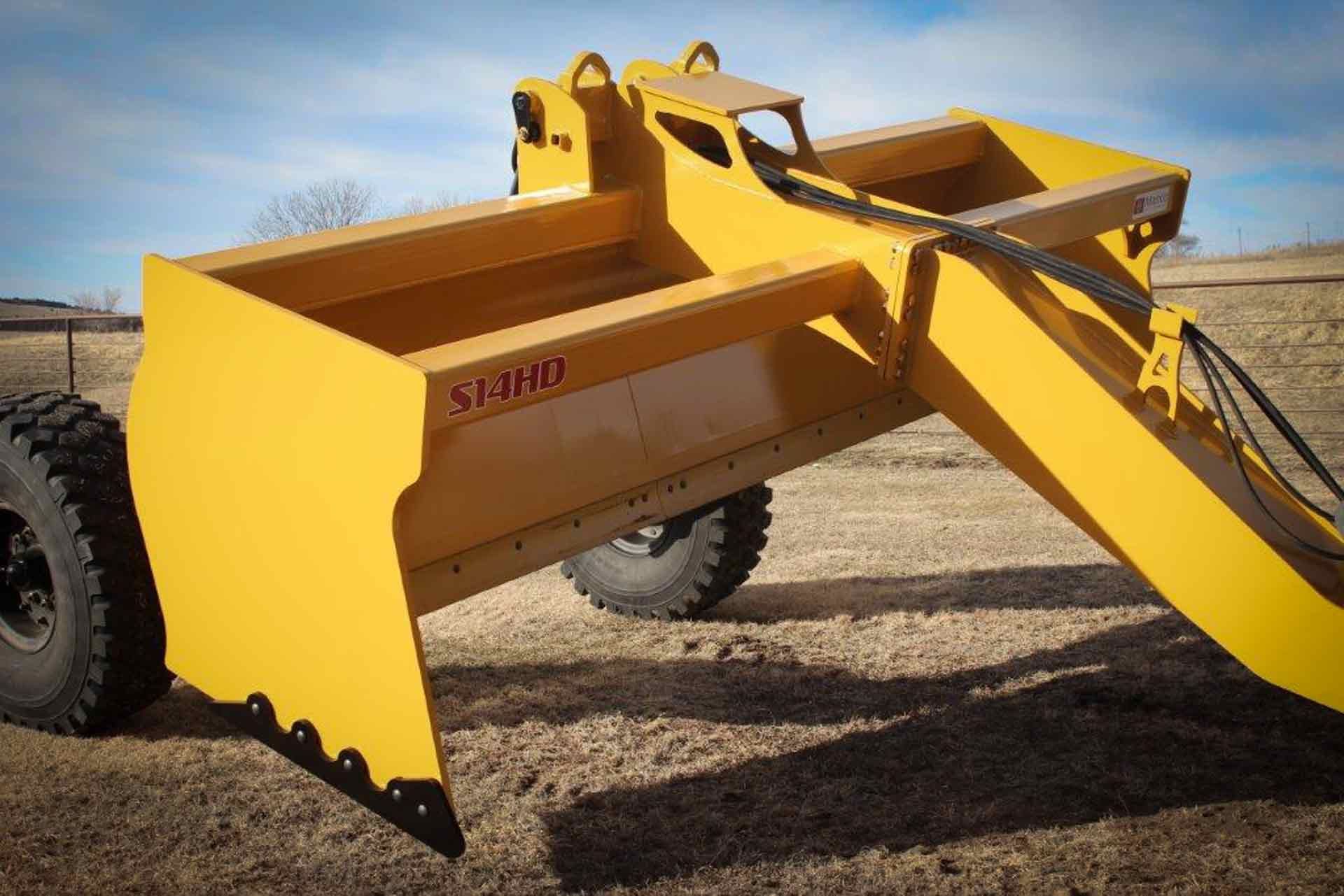 A yellow scraper with the word simple on it