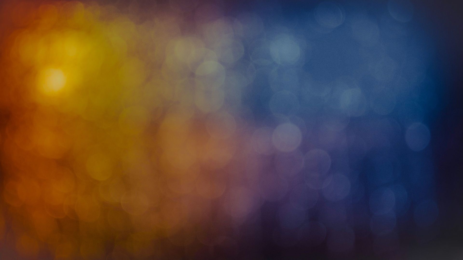 A blurry picture of a colorful background with a rainbow of colors.