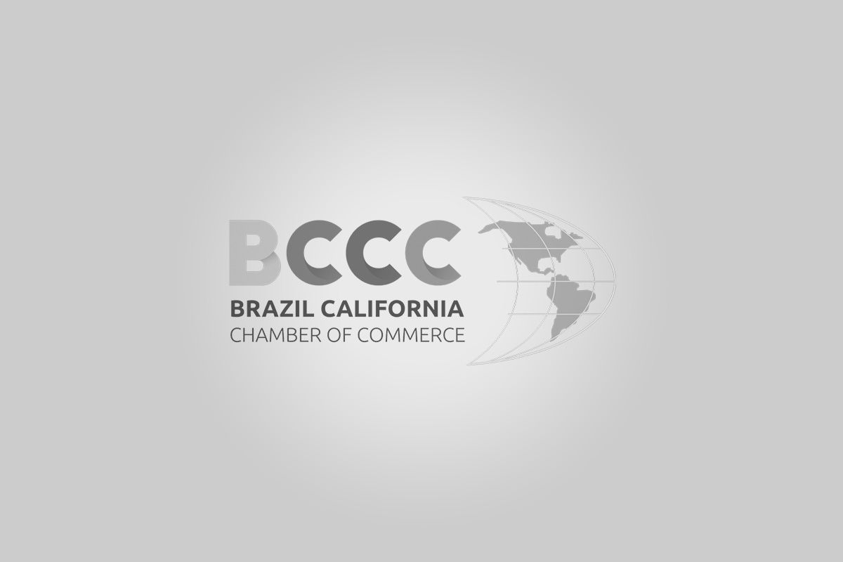 Logo of the Brazil California Chamber of Commerce with text and a globe graphic.