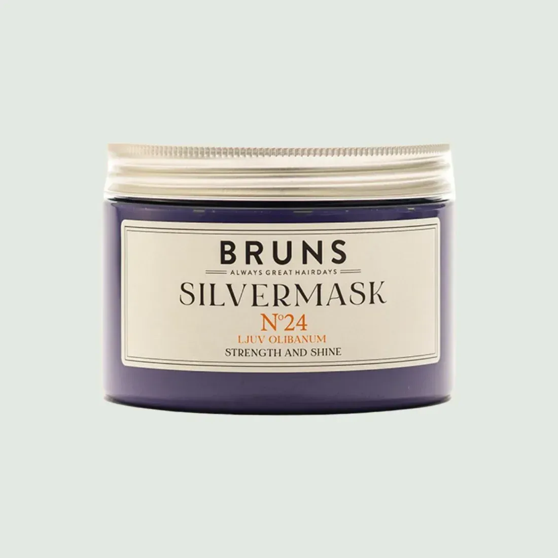 Potje Bruns Silvermask V24 haarverzorgingsproduct met paars etiket op een lichte achtergrond.