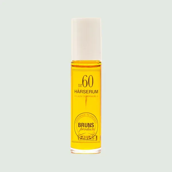 Gele fles haarserum met witte dop en 