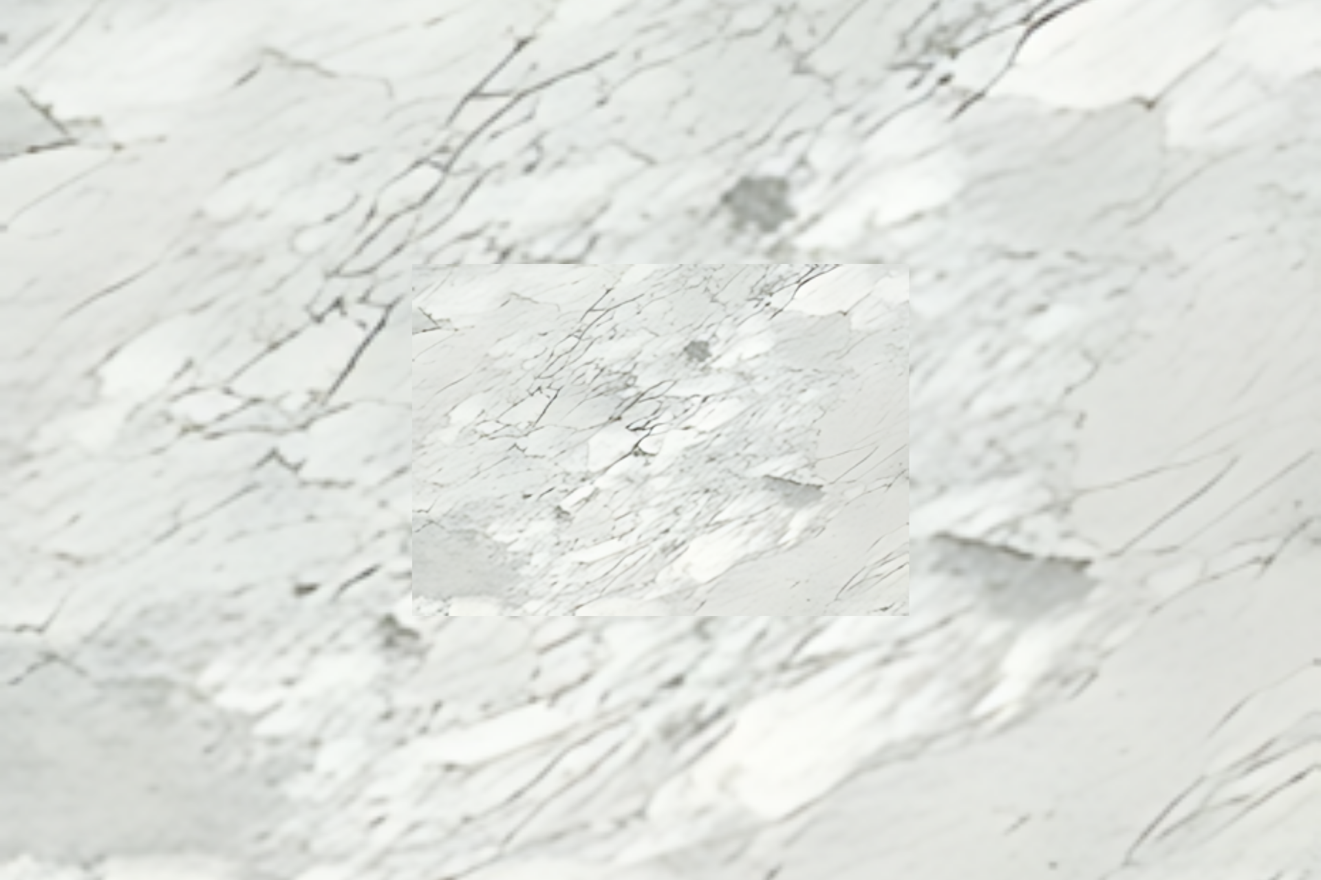 White marble stone texture with subtle gray veining and soft shadows