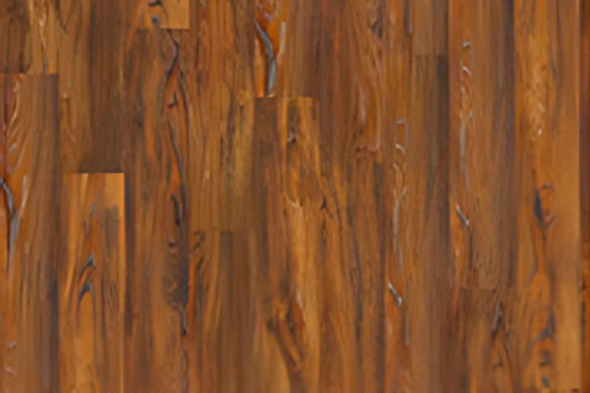 Close-up of a brown wooden plank surface with visible grain and knots