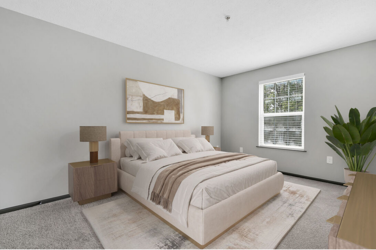 Modern bedroom with beige bed, nightstands, wall art, window, and neutral decor