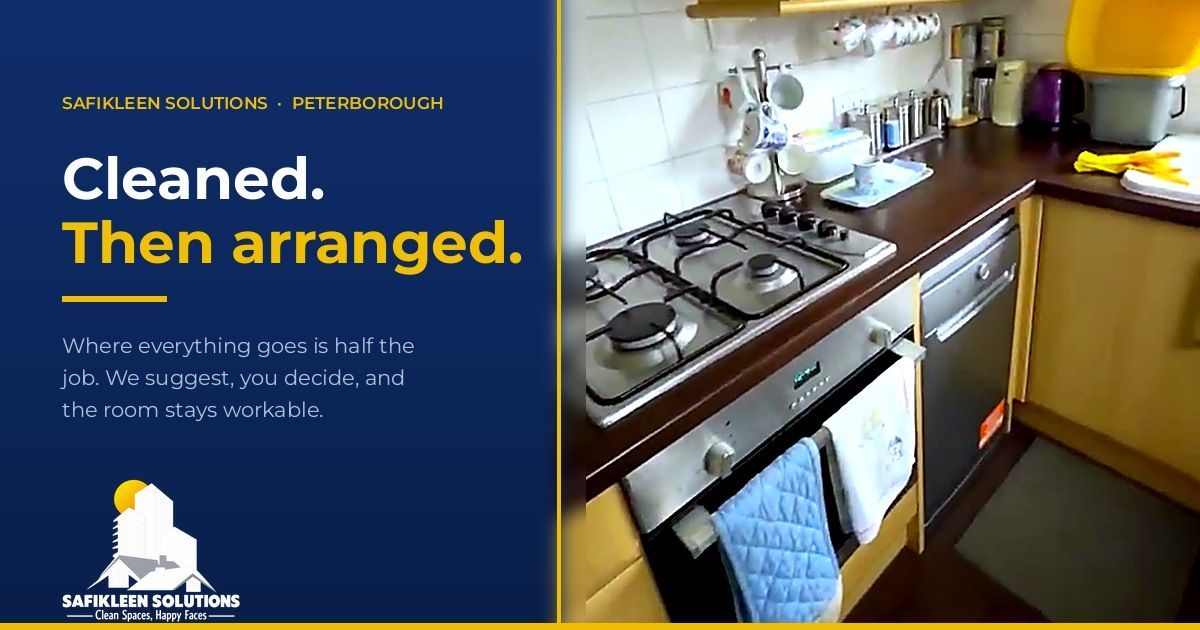 A Peterborough kitchen after a SafiKleen house clean, with mugs on the rail and the worktop left cle