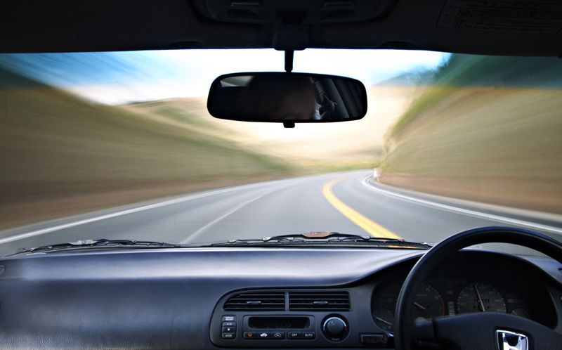 Car Running On A Curved Road - Bridgeview, IL - Route 66 Auto Glass