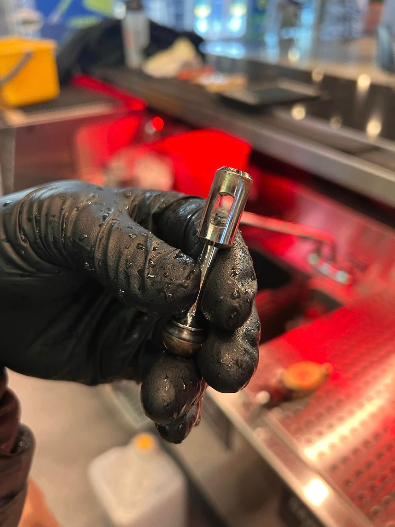 Close-up of organic residue build-up on draft system parts