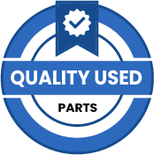 A blue and white circle with the words `` quality used parts '' written inside of it.