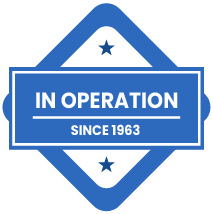 A blue and white label that says in operation since 1963