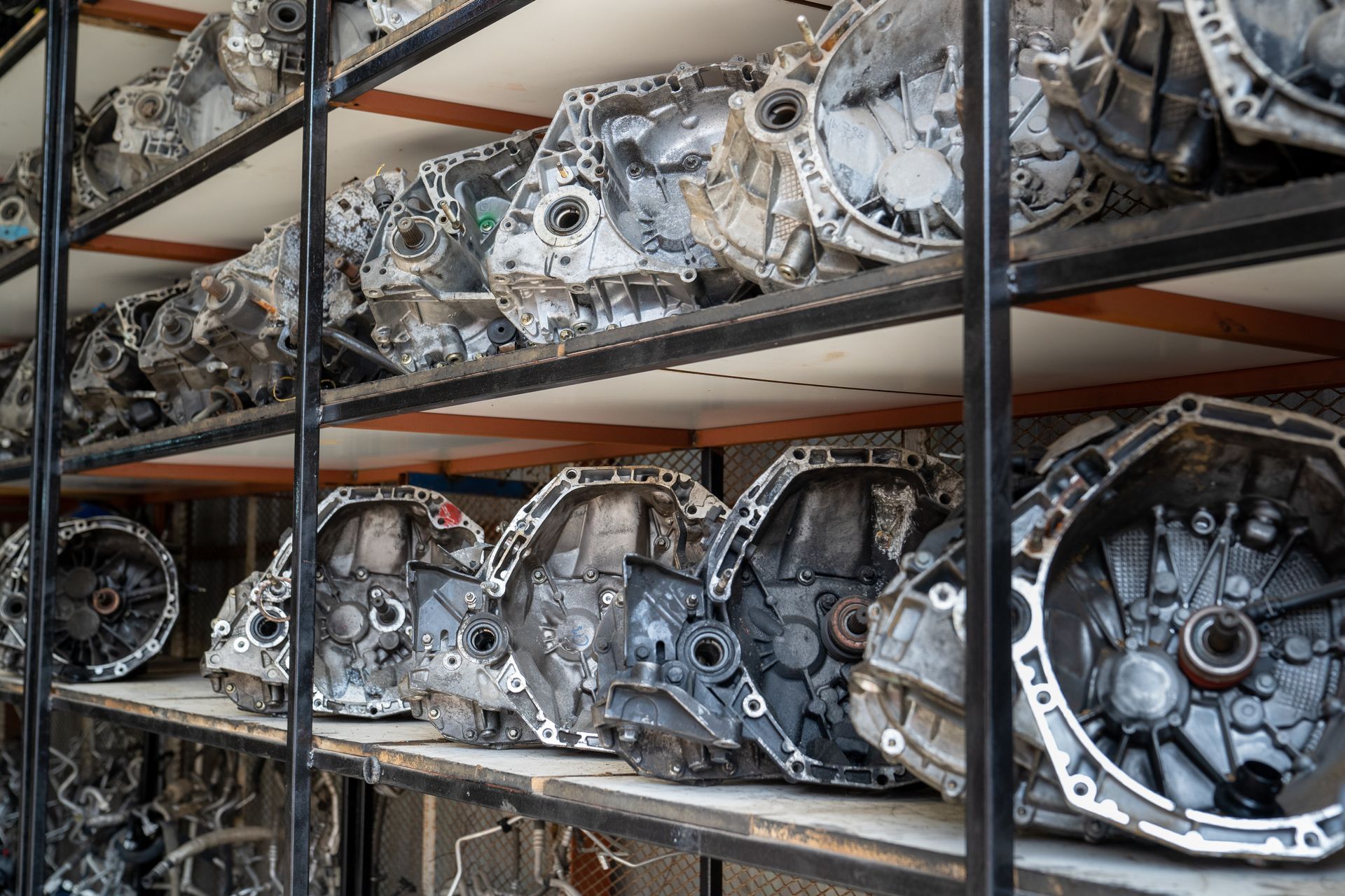 Used old working transmission auto parts on shelf.