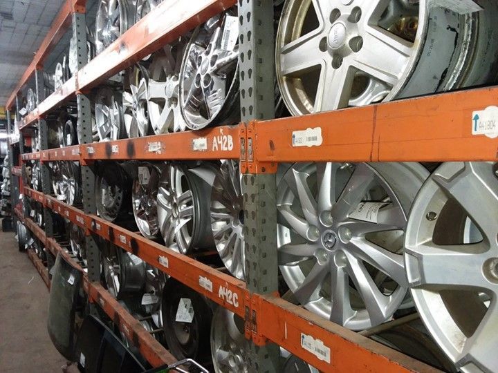 A warehouse filled with lots of wheels and tires
