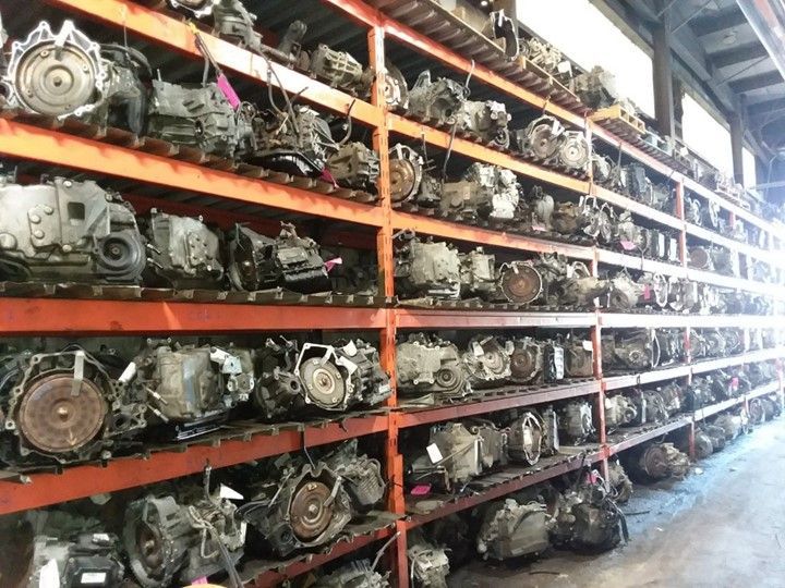 A warehouse filled with lots of different types of engines
