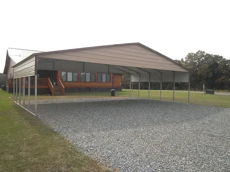 A house with a carport in front of it