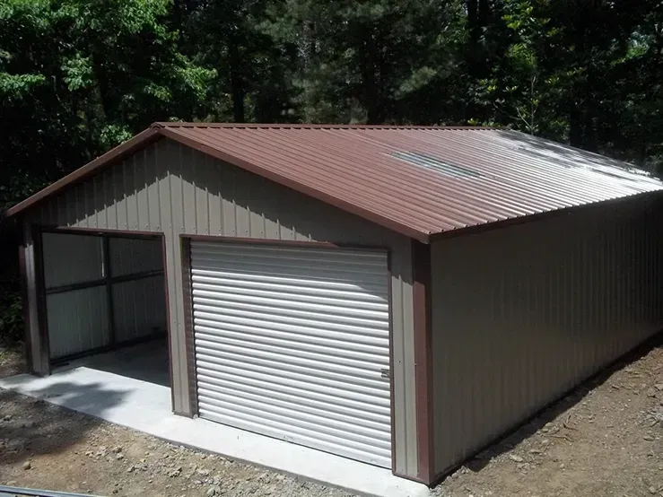 A garage with a brown roof and a white door