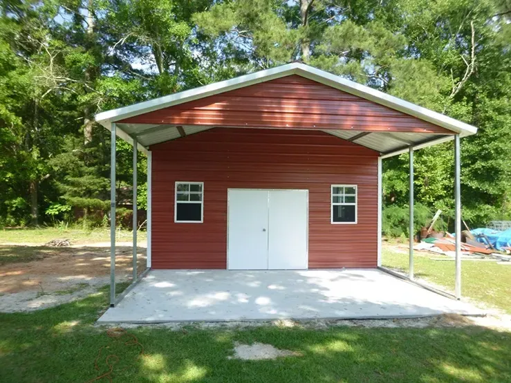A red garage with a white door and windows