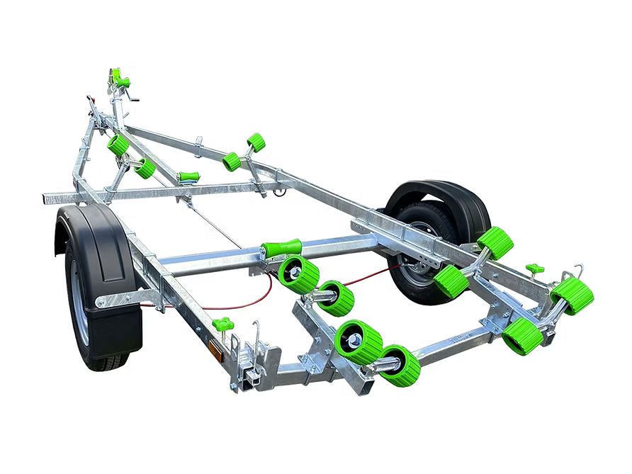 Boat trailer with blue rollers and black tires.