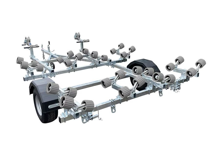 Boat trailer with numerous red rollers and a black tire.
