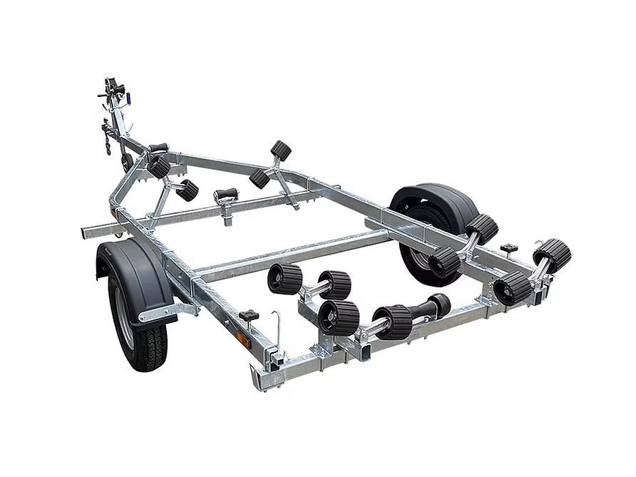 Boat trailer with blue rollers, gray frame, and black wheels.