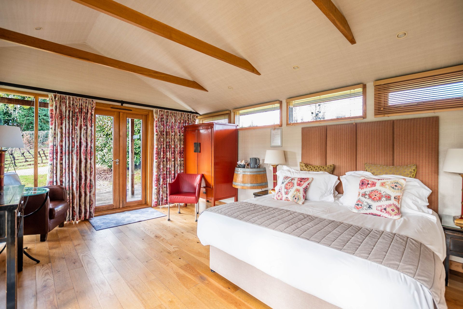 Romantic luxury lodge exterior at Three Choirs, surrounded by peaceful countryside – ideal for couples' escapes