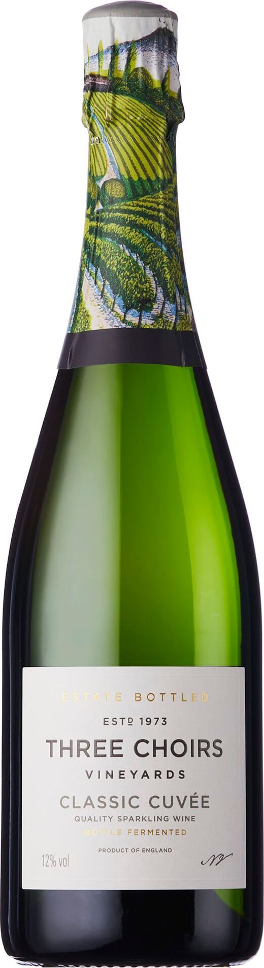 A bottle of Three Choirs Classic Cuvée sparkling wine. The bottle is mostly green glass, with a white label and a floral cap.
