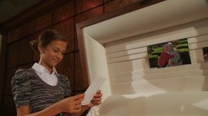 Girl Looking into Casket