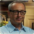 Man Smiling With Glasses