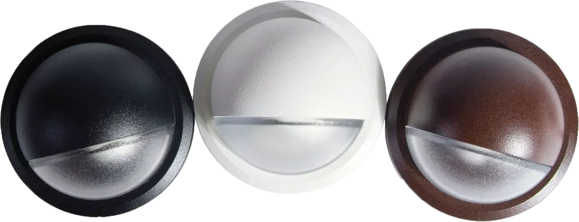 Three circular LED stair lights in black, white, and bronze finishes, featuring a downward-facing louvered design.