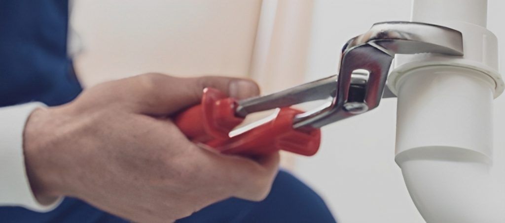 using wrench on pipe