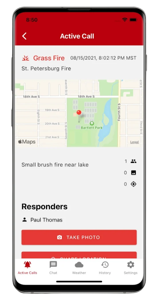 A cell phone with a map on it and a red button that says