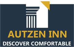 The logo for autzen inn is blue and yellow and says `` discover comfortable ''.