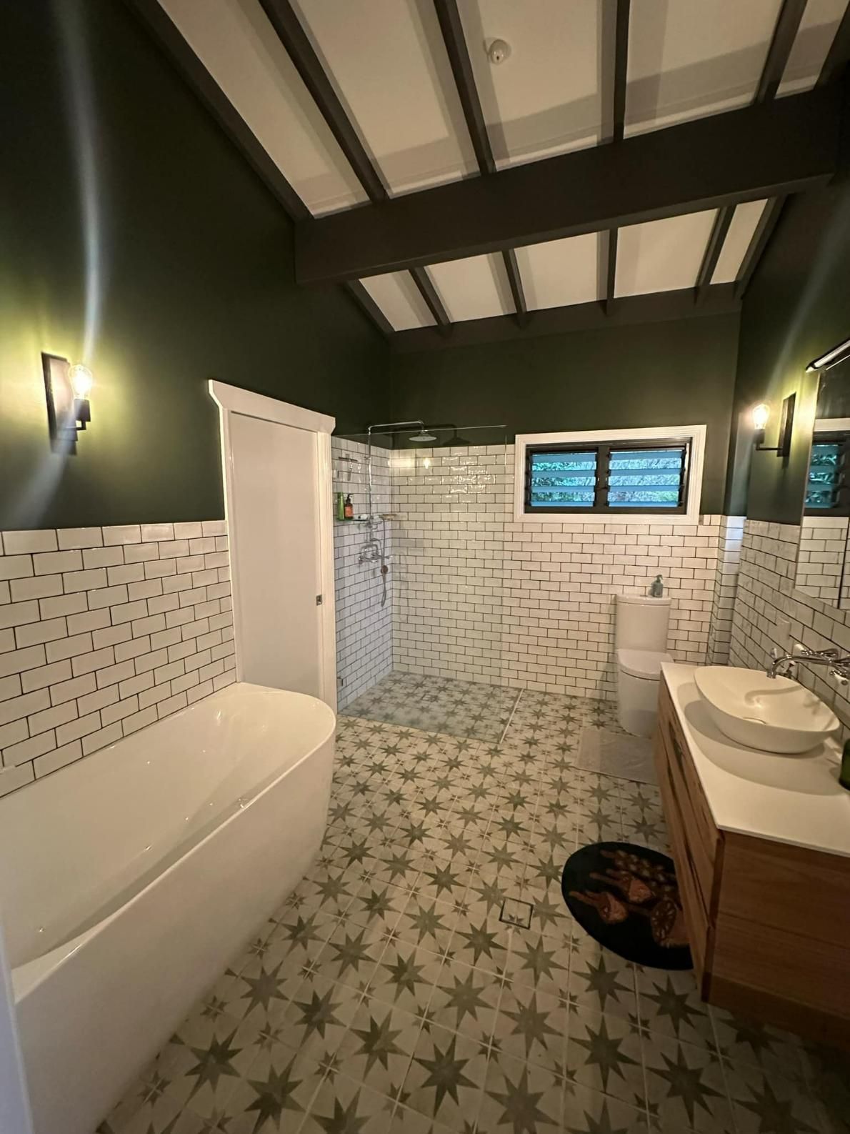 A Bathroom With A Bathtub, Toilet, Sink And Shower — Connect Mid Coast Electrical Services In Old Bar, NSW