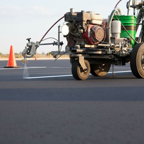 Parking Lot Striping Machine Laying down lines on concrete in Scottsdale