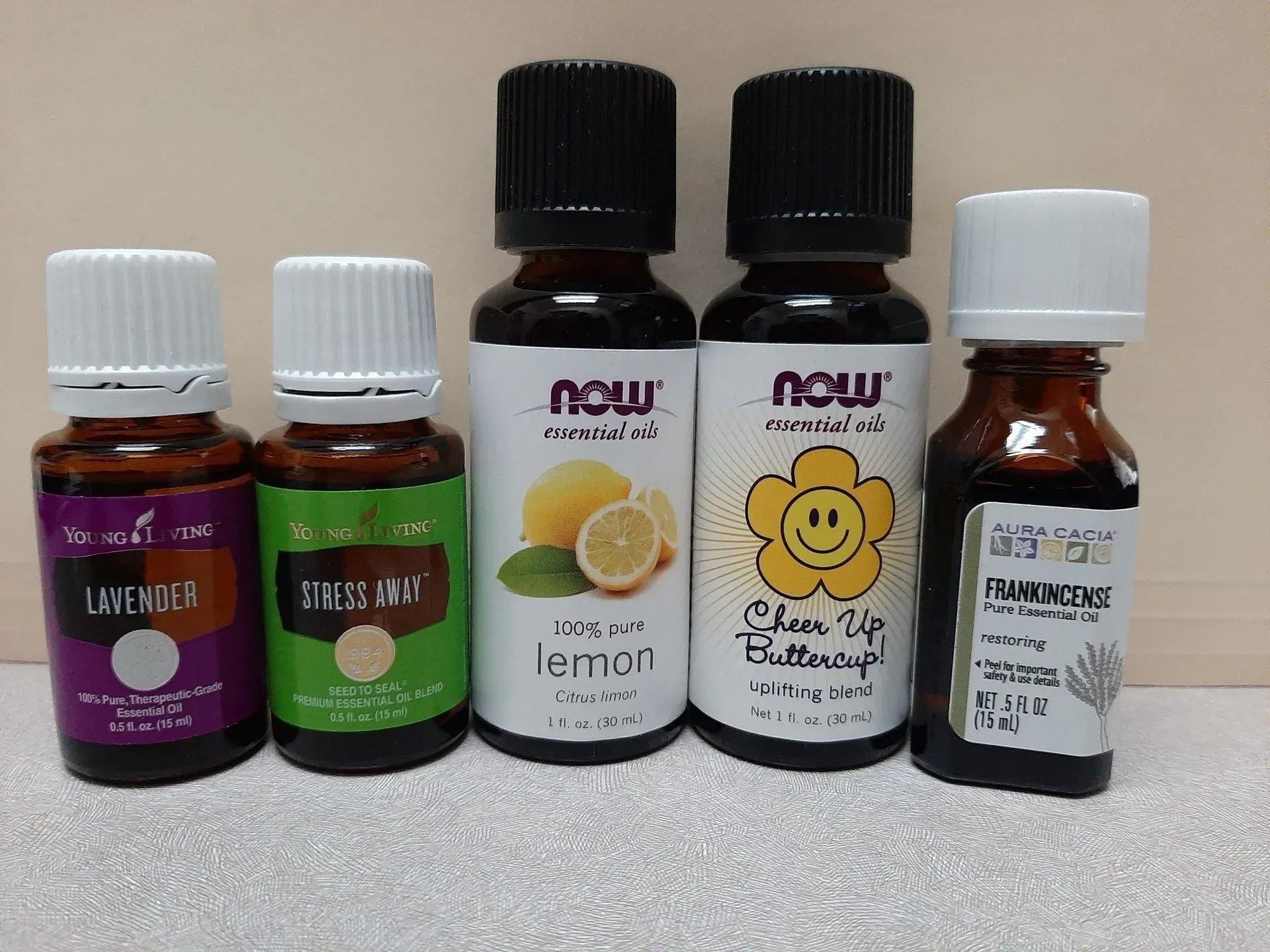 Essential oil dropper bottles collection on white background
