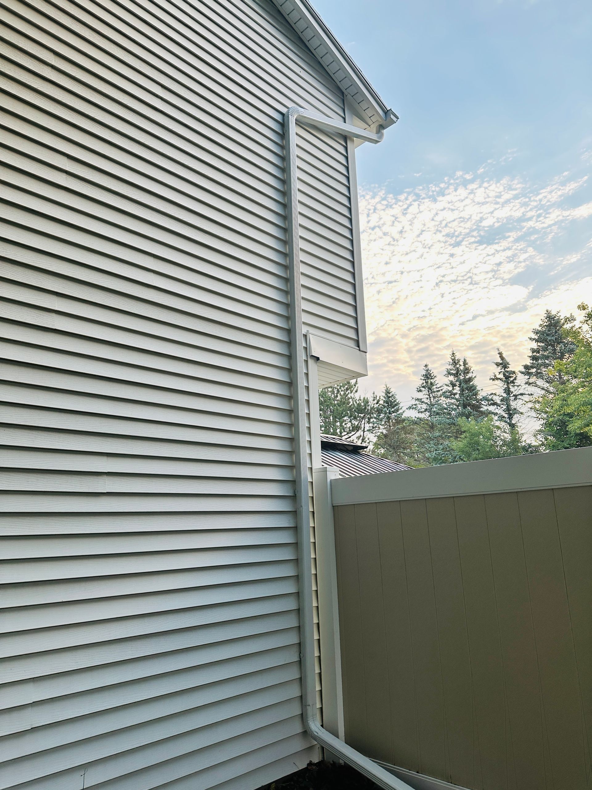 Downspout from a recent gutter installation