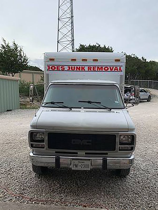 Front view of a GMC box truck with 