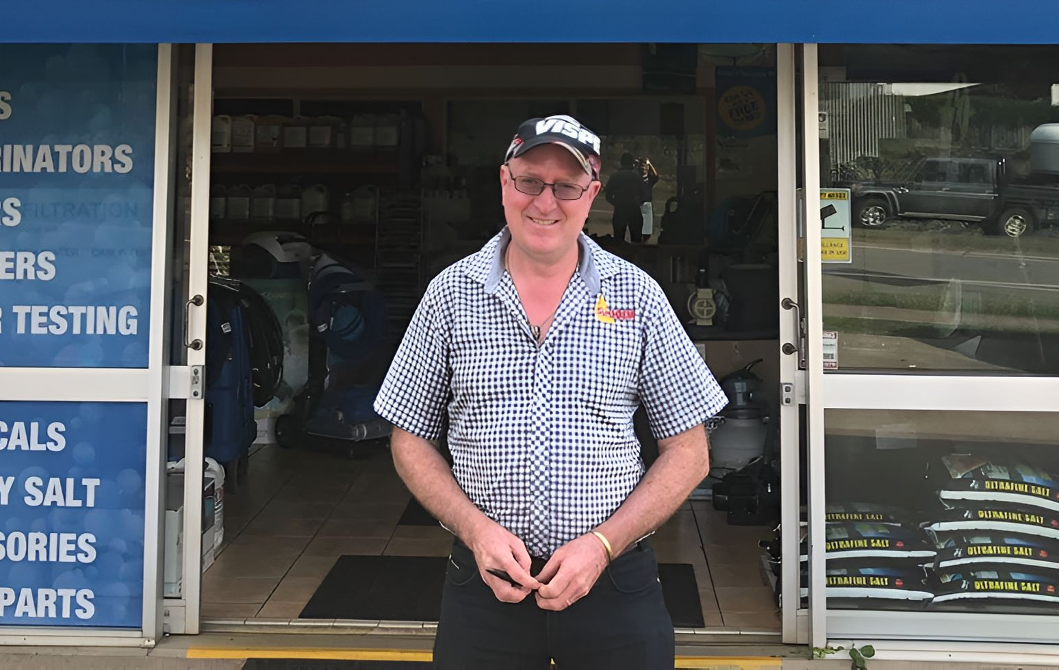 A Man Standing In Front Of A Sunchem Store — Sunchem Quality Cleaning Products In Gympie, QLD